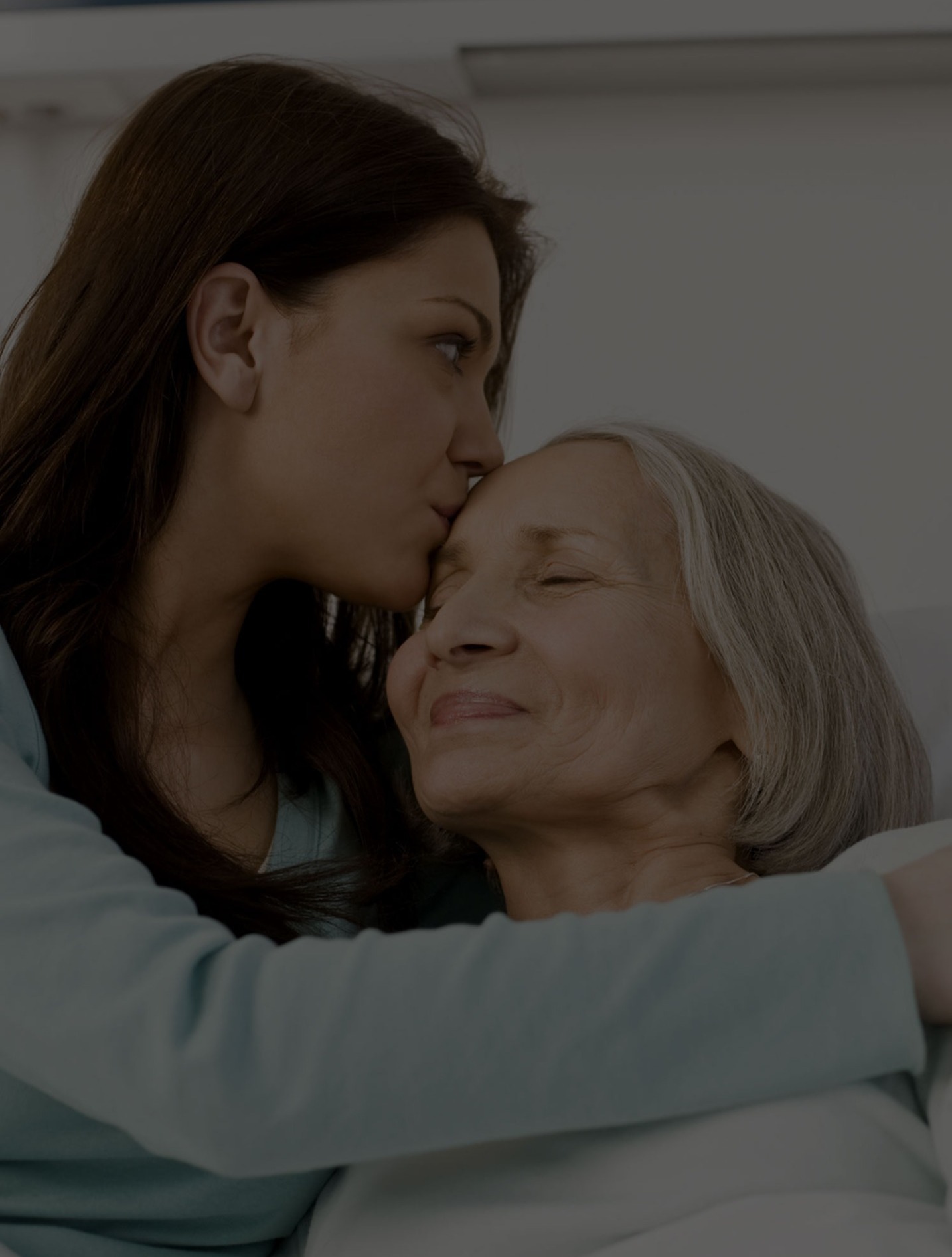 A mother and daughter embracing after discussing available homecare services